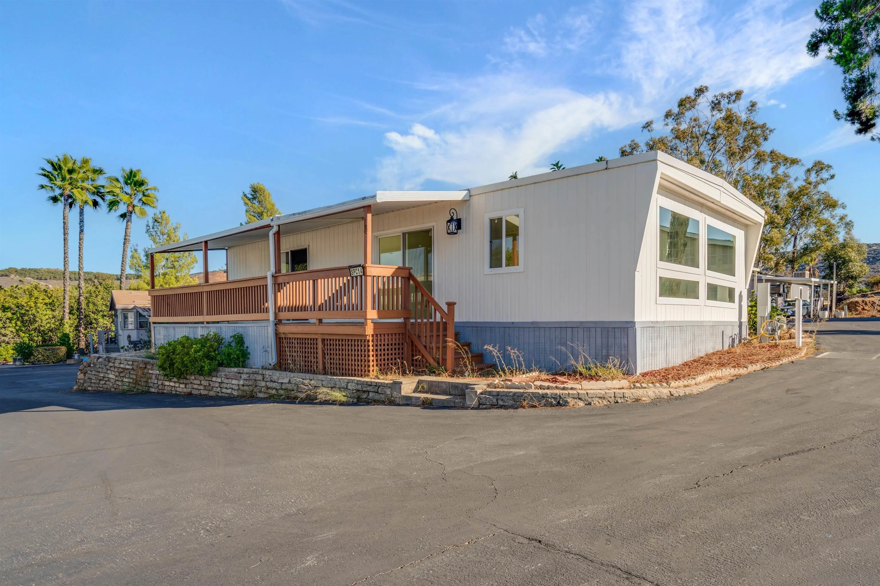 13490 Highway 8 Business, Unit SPC 14 Lakeside, CA 92040 - Photo 17 of 25 front view of a house with a street