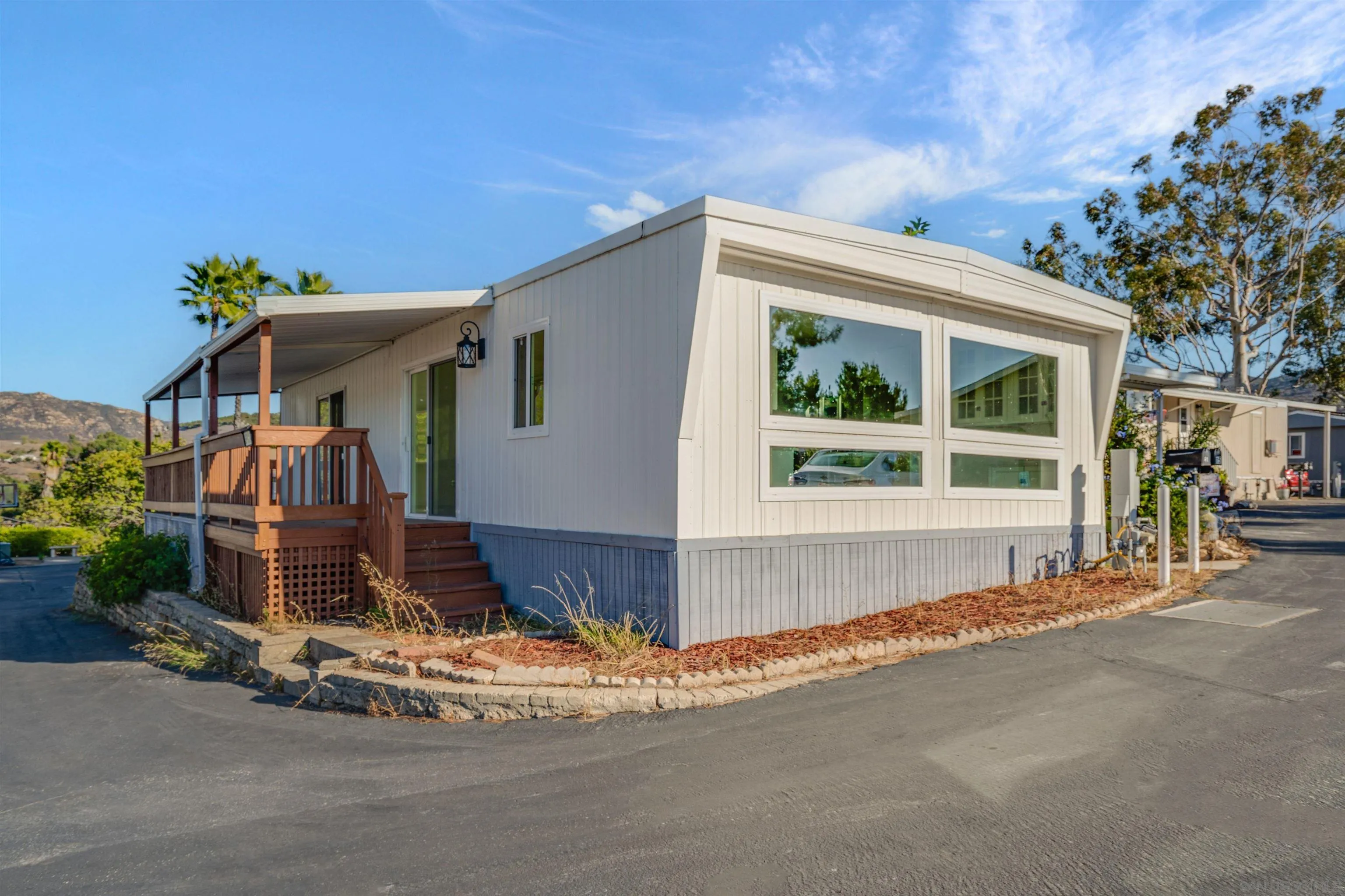 13490 Highway 8 Business, Unit SPC 14 Lakeside, CA 92040 - Photo 18 of 25 a front view of a house with a outdoor space