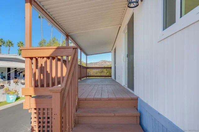a view of stairs and with wooden floor