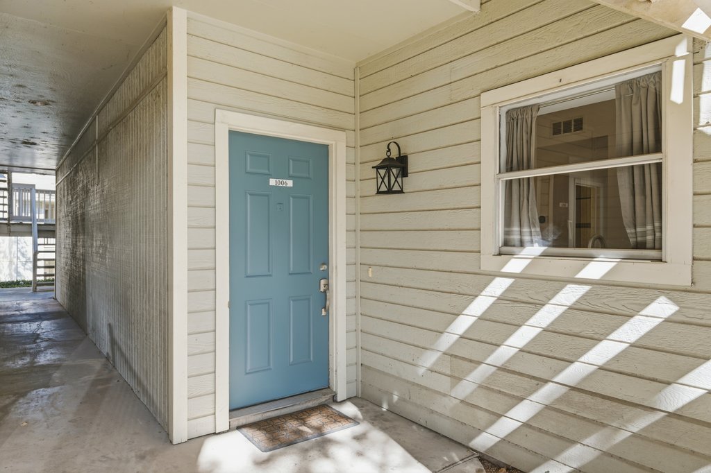2450 Wickersham Lane, Unit 1006 Austin, TX 78741 - Photo 26 of 27 a view of a door and a window