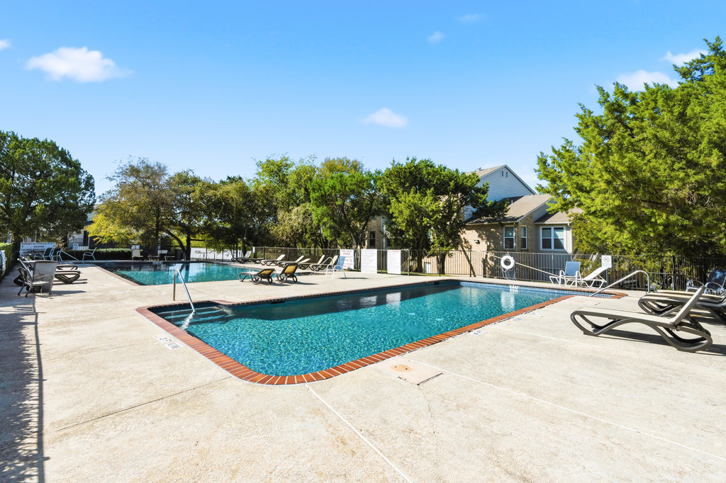 2450 Wickersham Lane, Unit 1006 Austin, TX 78741 - Photo 27 of 27 a view of swimming pool with a yard