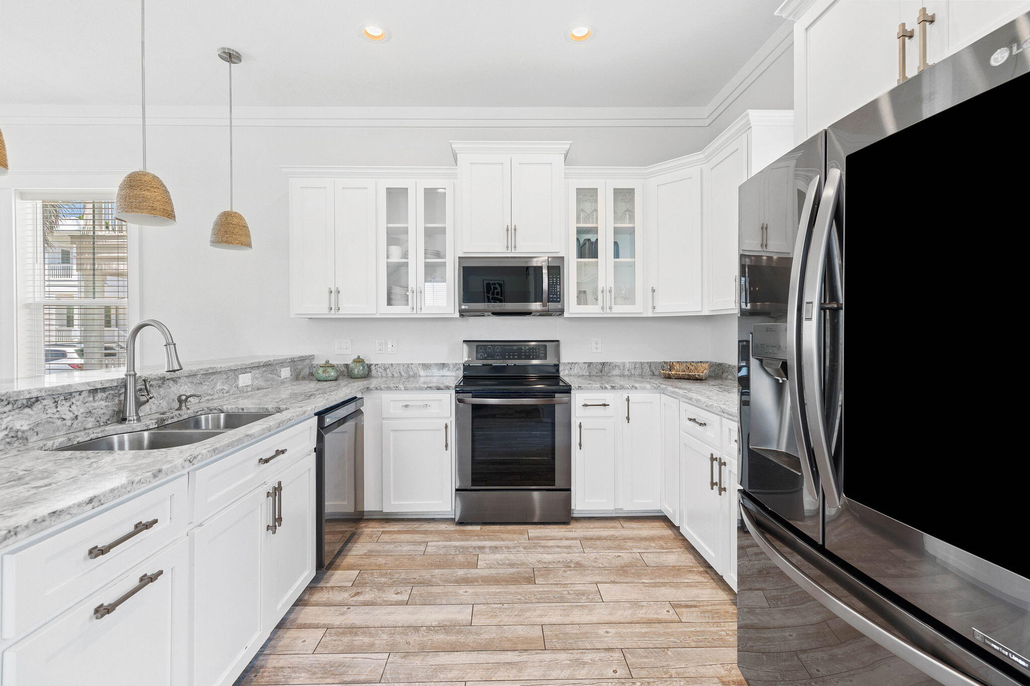 44 Abbey Road Santa Rosa Beach, FL 32459 - Photo 16 of 52 a kitchen with white cabinets and appliances