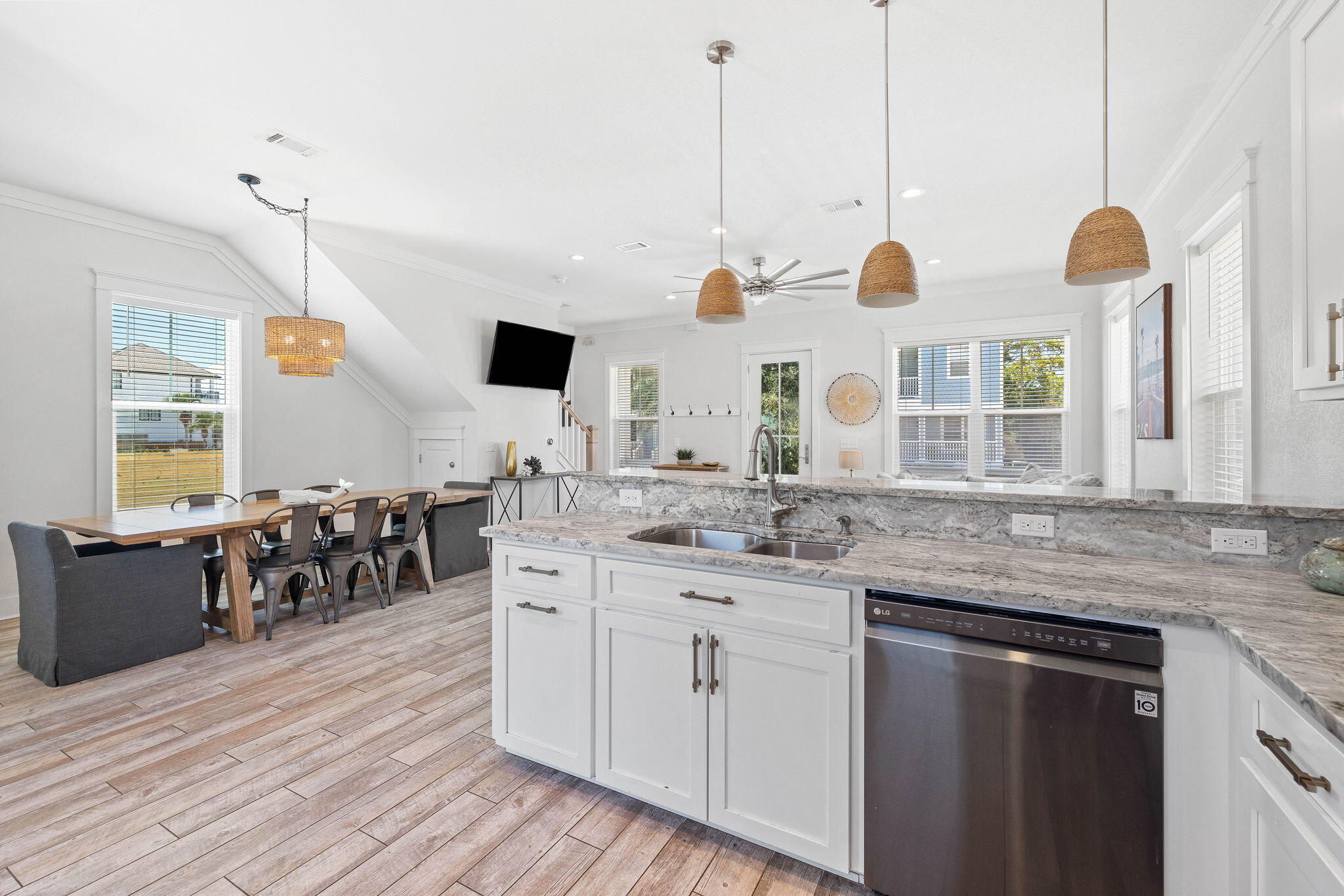 44 Abbey Road Santa Rosa Beach, FL 32459 - Photo 18 of 52 a kitchen with stainless steel appliances granite countertop a stove a sink and a wooden floors