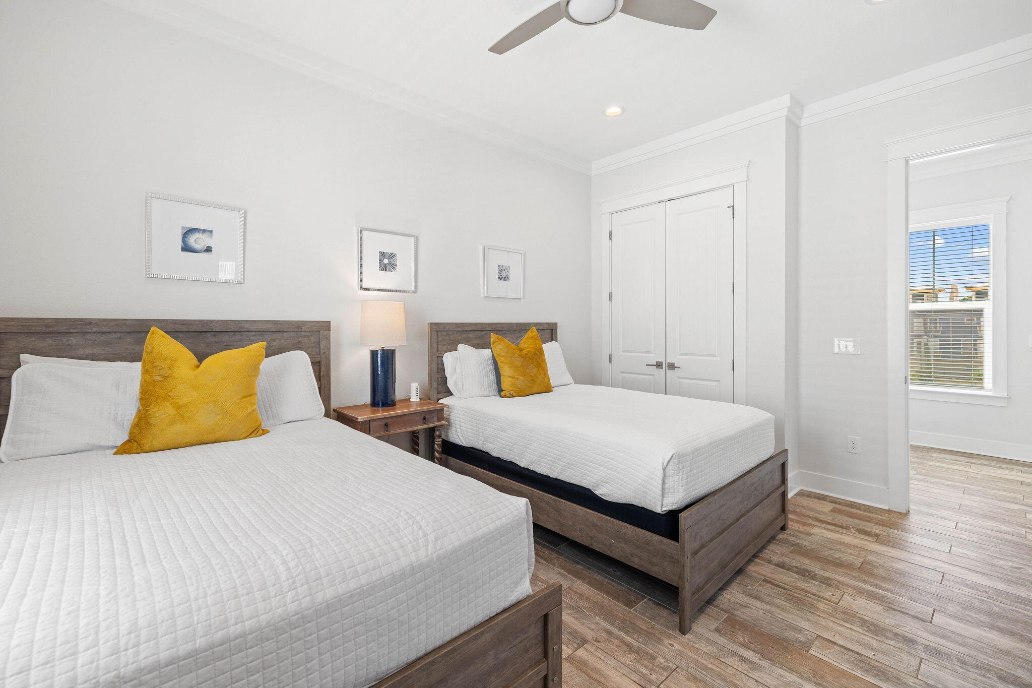 44 Abbey Road Santa Rosa Beach, FL 32459 - Photo 22 of 52 a bedroom with two beds and wooden floor