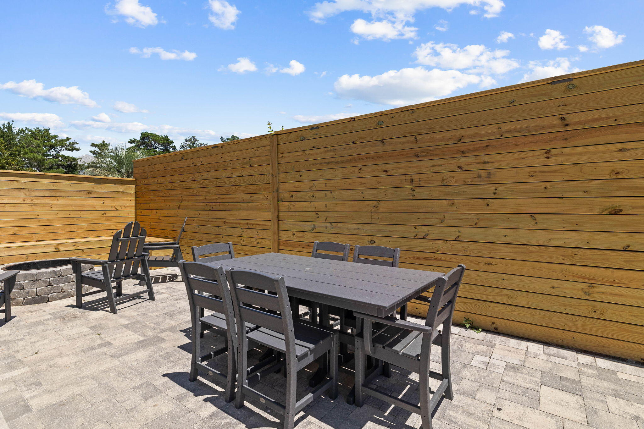 44 Abbey Road Santa Rosa Beach, FL 32459 - Photo 45 of 52 a view of a dinning table and chairs in the patio