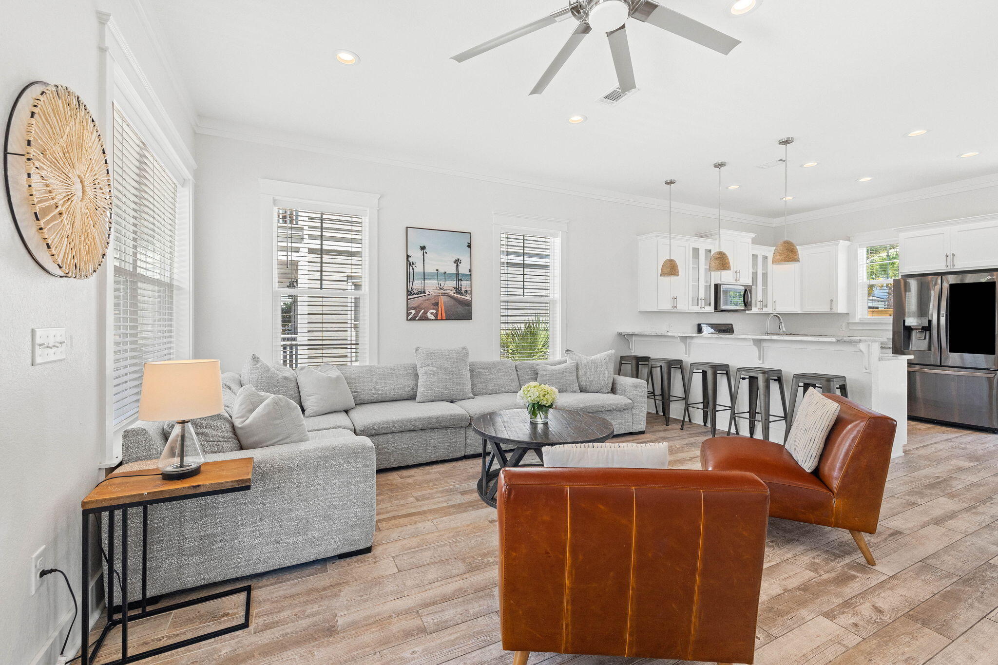 44 Abbey Road Santa Rosa Beach, FL 32459 - Photo 6 of 52 a living room with furniture wooden floor and a large window