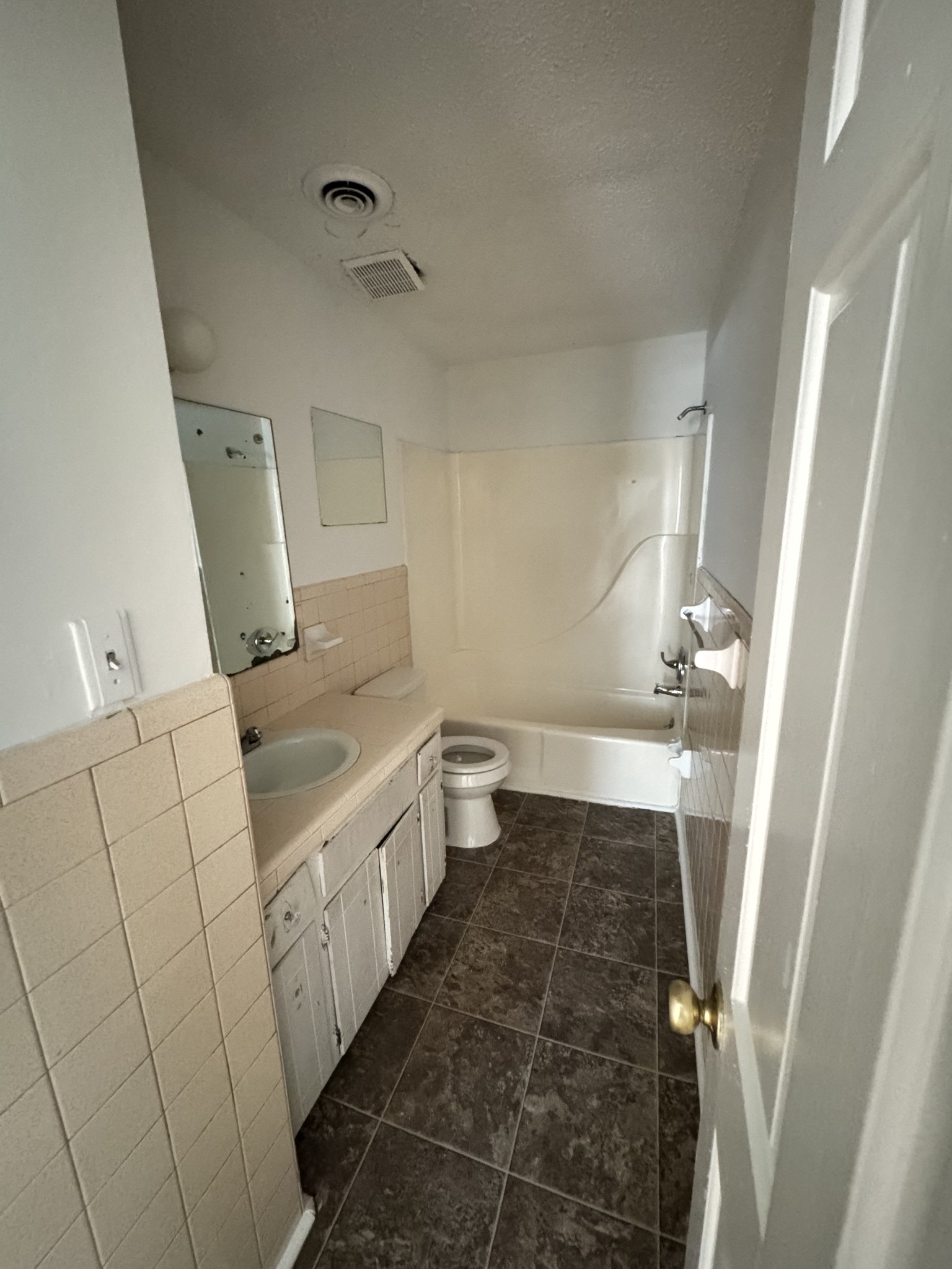 313 Bridge Avenue Murfreesboro, TN 37129 - Photo 5 of 6 a bathroom with a sink a toilet and vanity