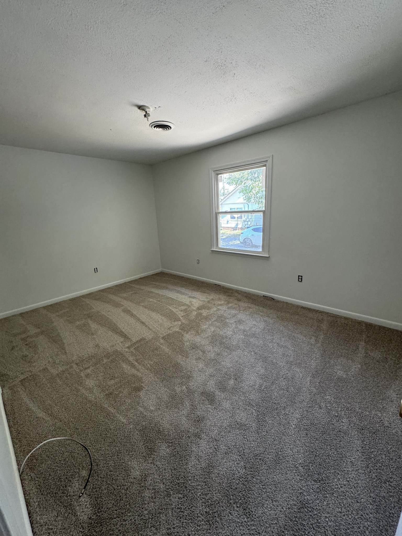 313 Bridge Avenue Murfreesboro, TN 37129 - Photo 6 of 6 an empty room with windows