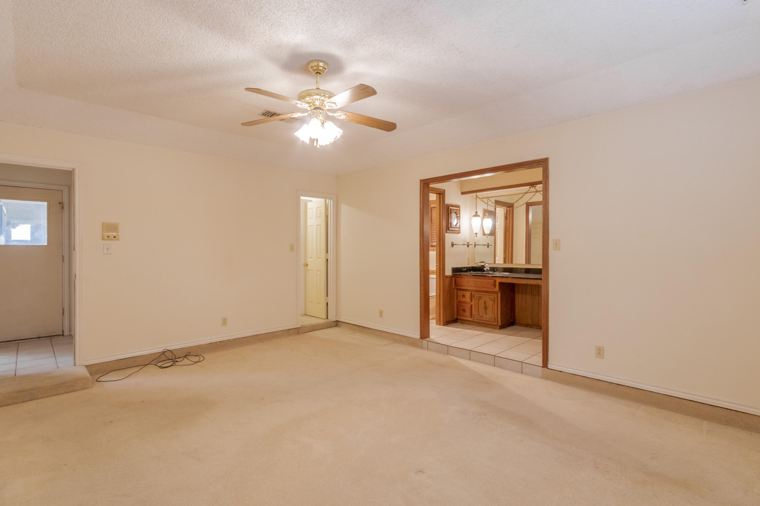 5714 73rd Street Lubbock, TX 79424 - Photo 16 of 38 a view of a livingroom with a kitchen