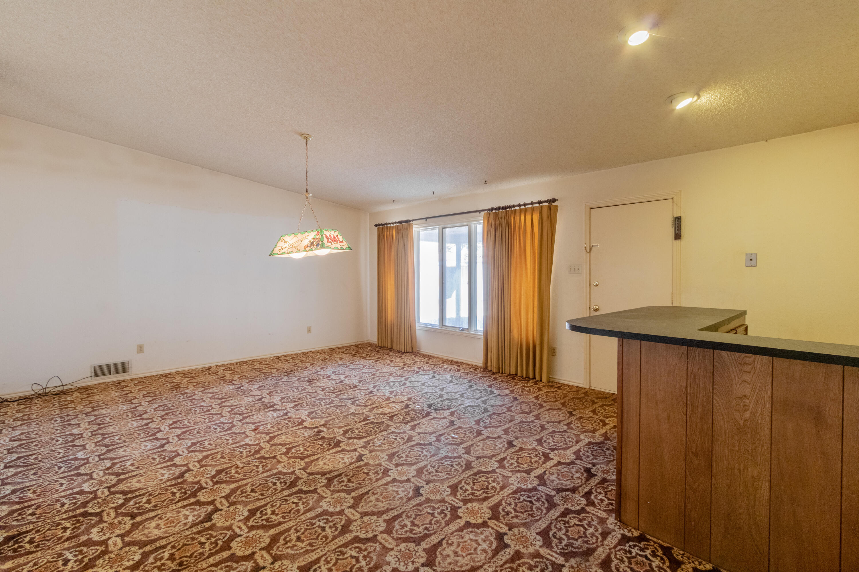 5714 73rd Street Lubbock, TX 79424 - Photo 21 of 38 a view of a bathroom with a sink and a window