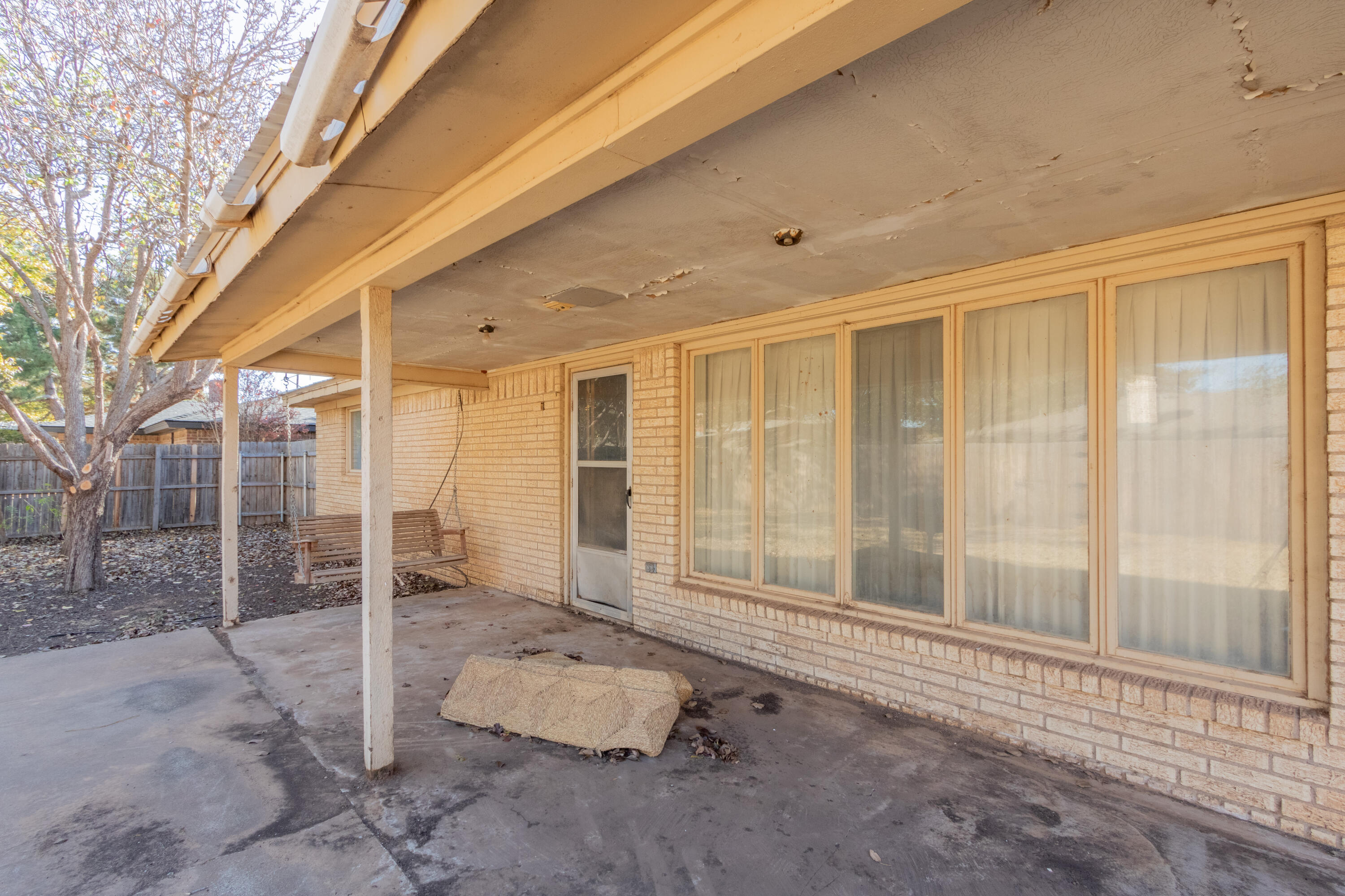 5714 73rd Street Lubbock, TX 79424 - Photo 38 of 38 a bathroom with a tub and shower