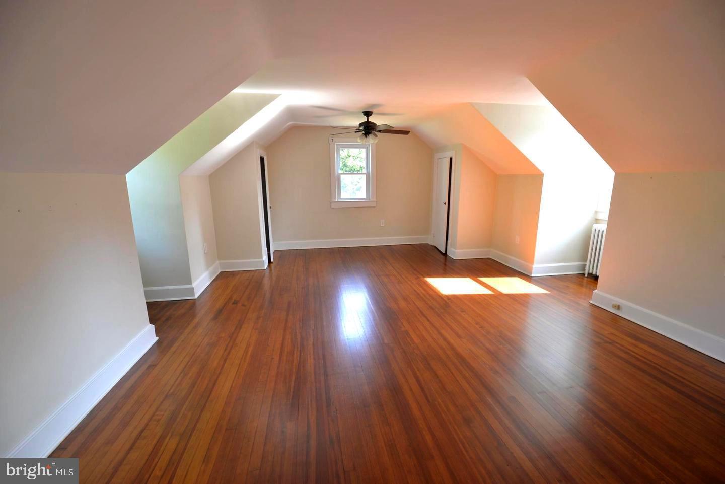 720 Church Hill Road Centreville, MD 21617 - Photo 11 of 16 wooden floor in an empty room with a window