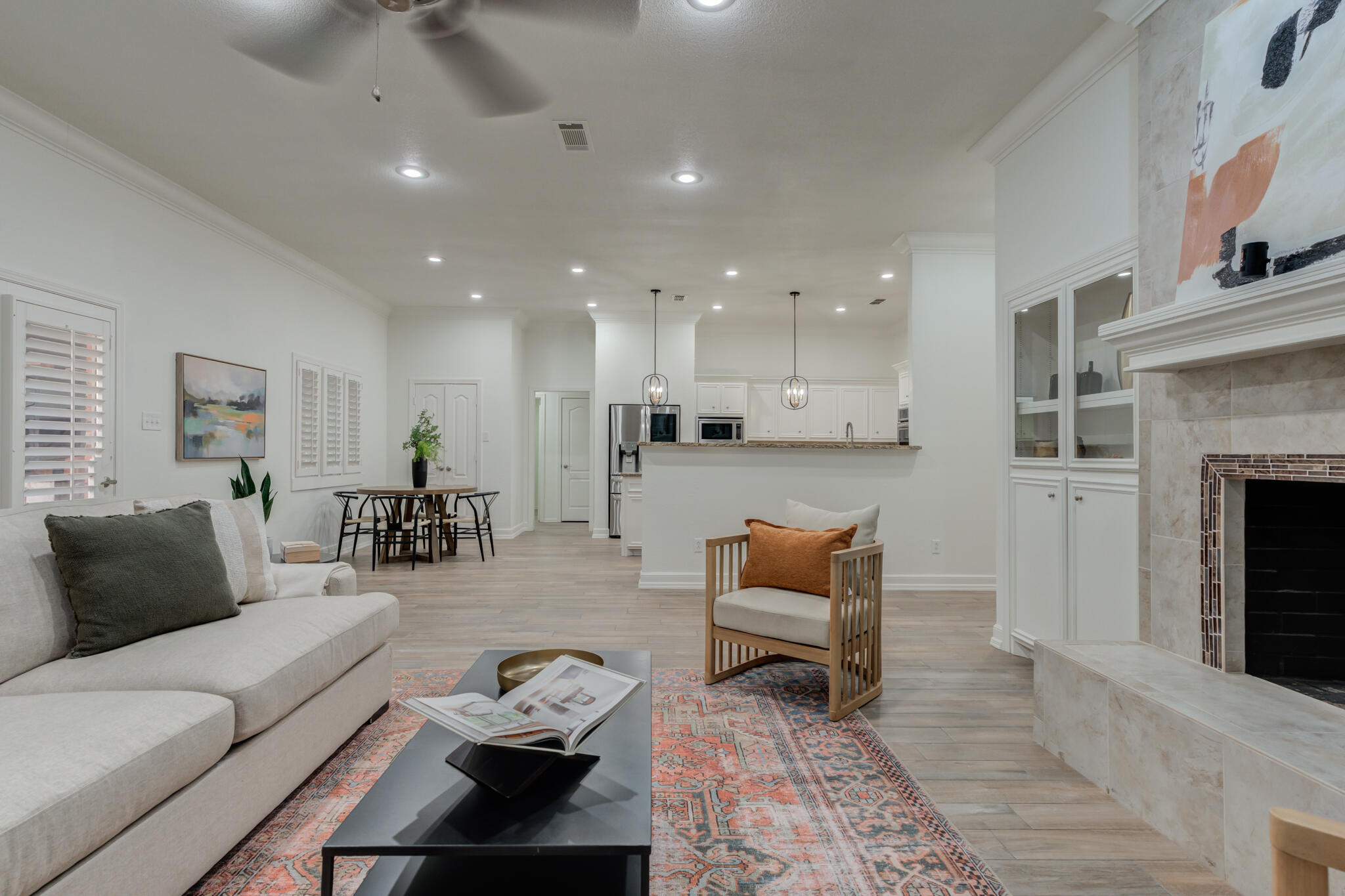 4707 85th Street Lubbock, TX 79424 - Photo 12 of 63 a living room with furniture and a fireplace