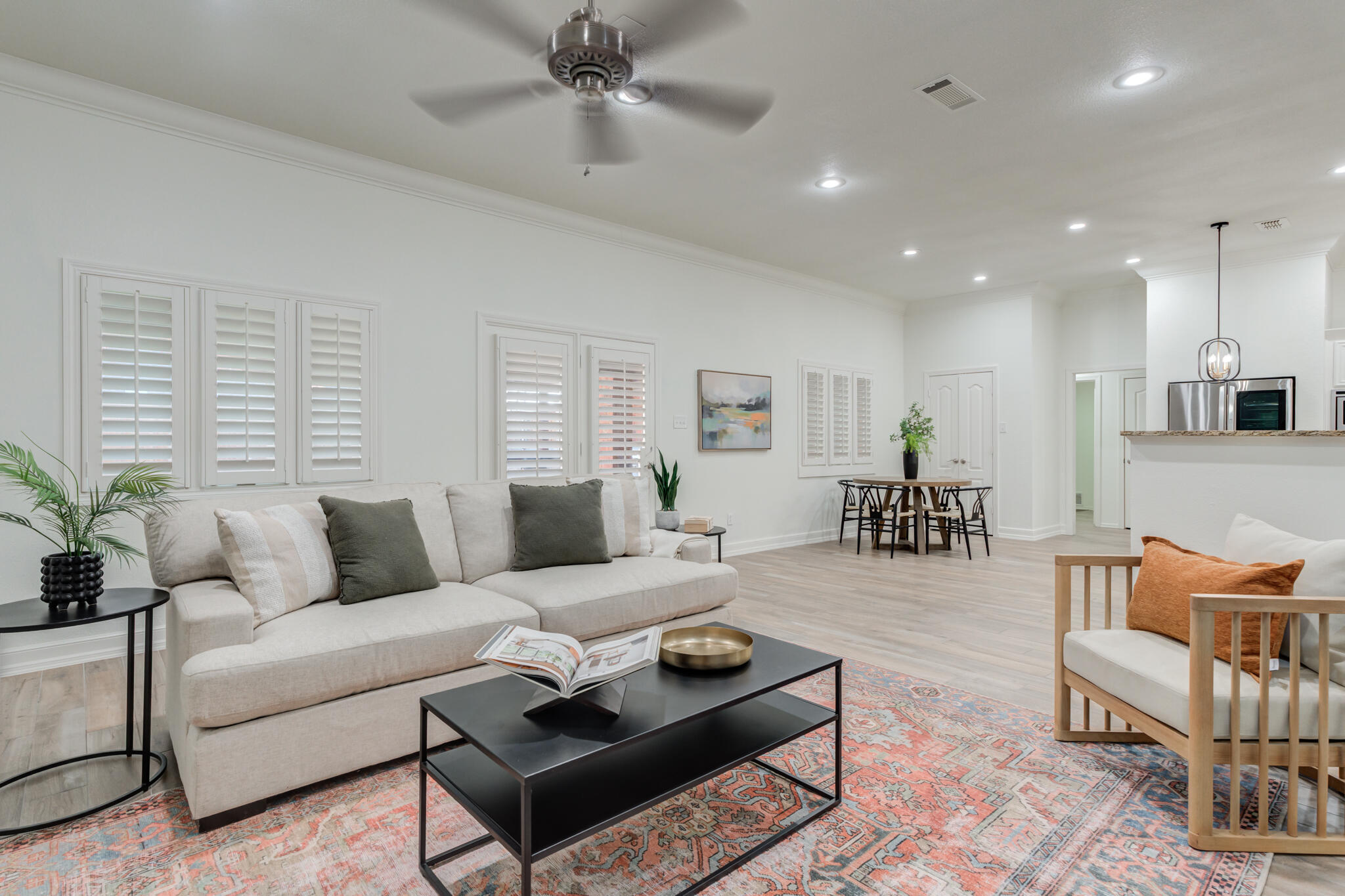 4707 85th Street Lubbock, TX 79424 - Photo 13 of 63 a living room with furniture and a large window