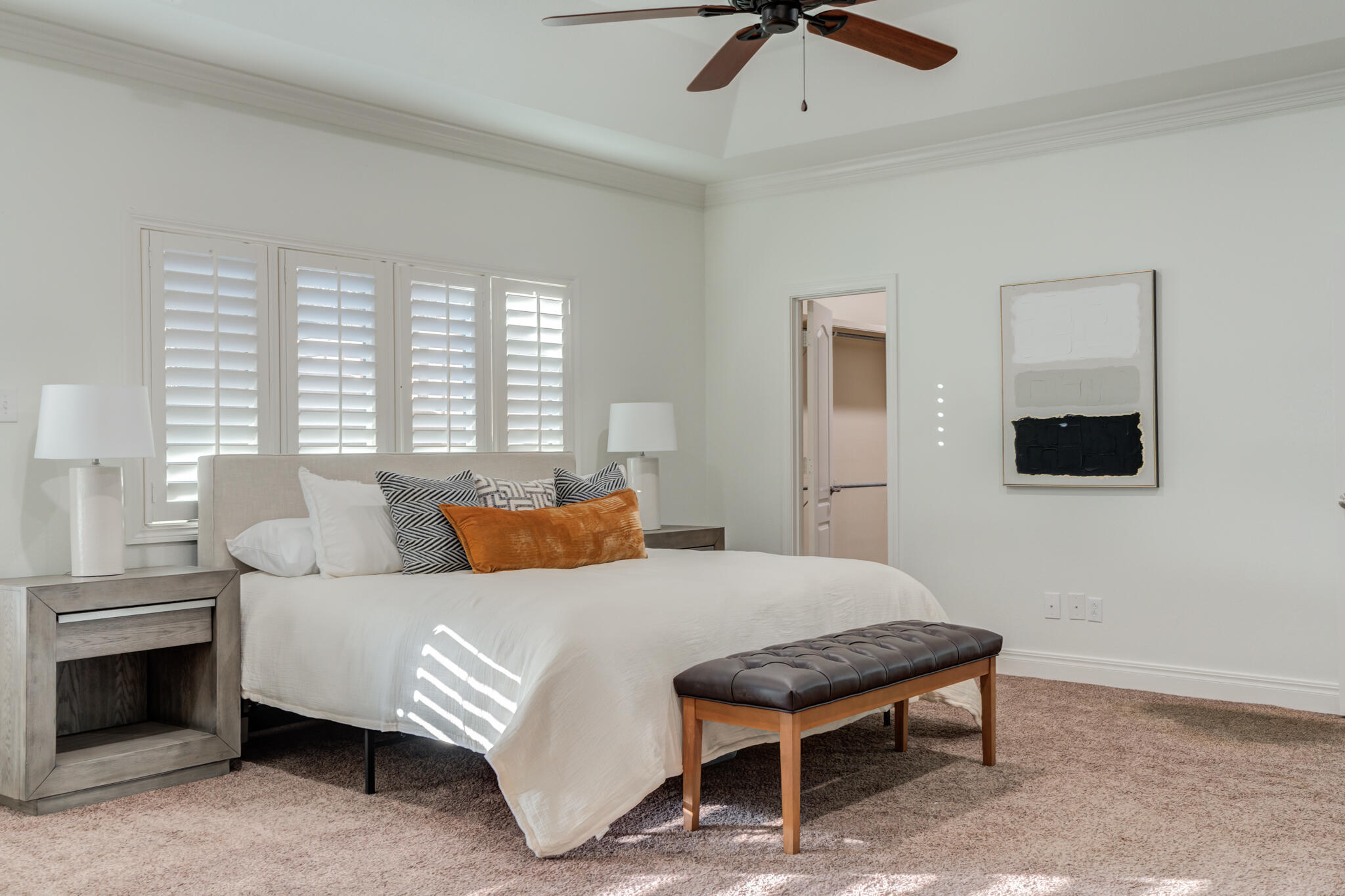 4707 85th Street Lubbock, TX 79424 - Photo 32 of 63 a bed room with a bed and a couch