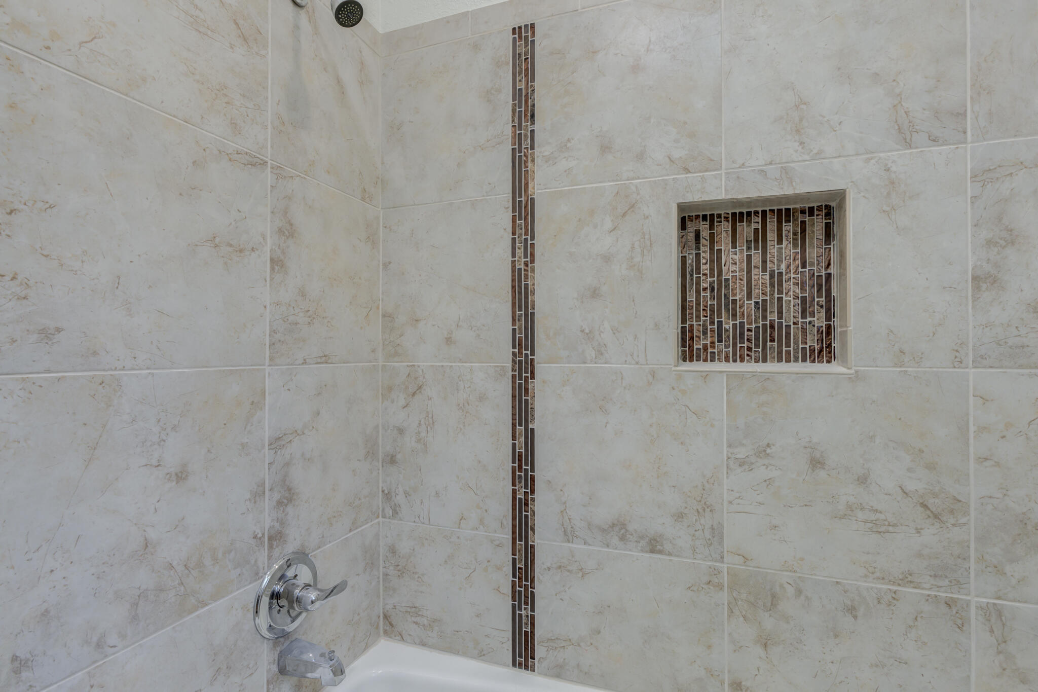 4707 85th Street Lubbock, TX 79424 - Photo 52 of 63 a bathroom with a shower