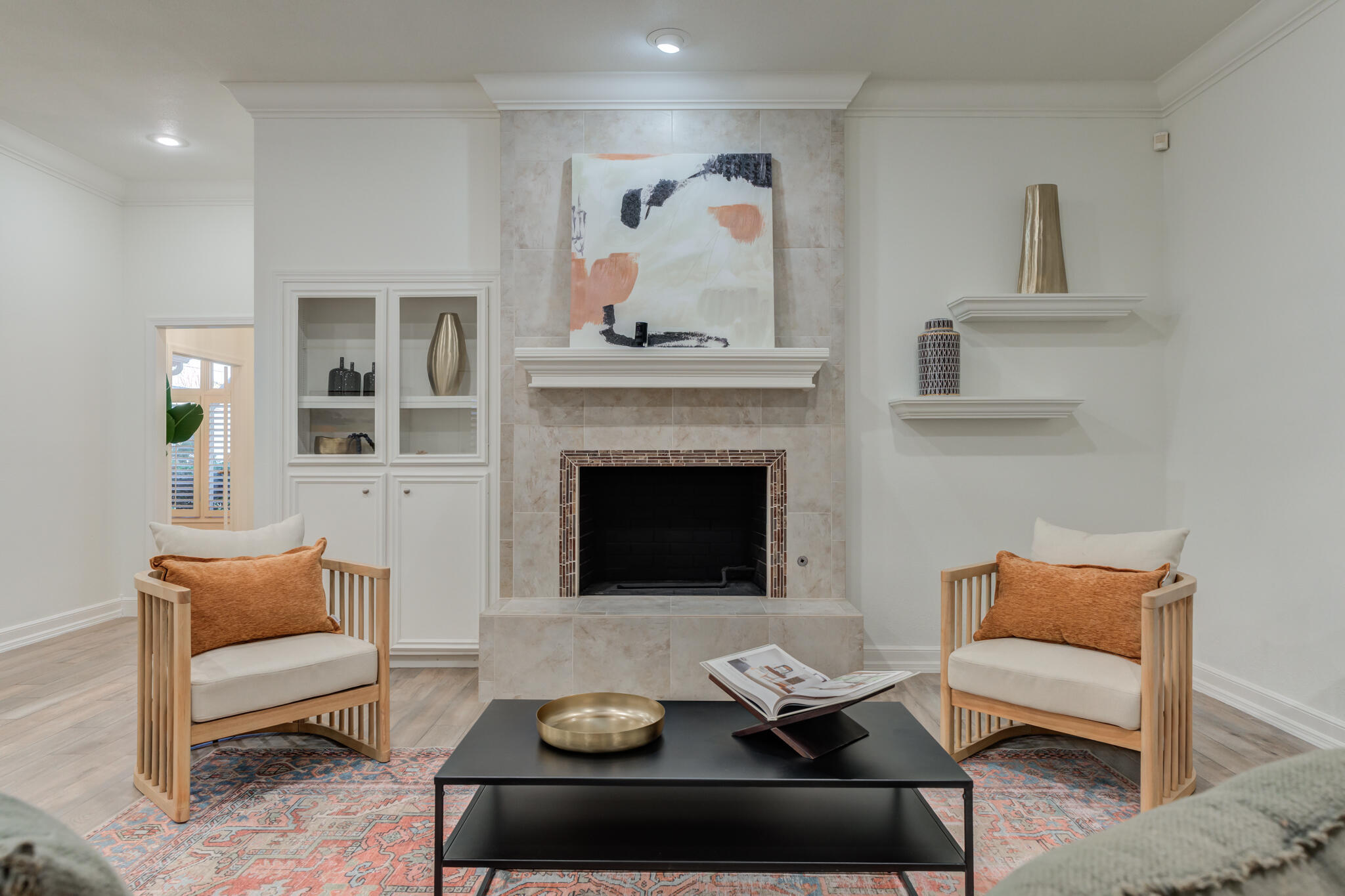 4707 85th Street Lubbock, TX 79424 - Photo 8 of 63 a living room with furniture and a fireplace