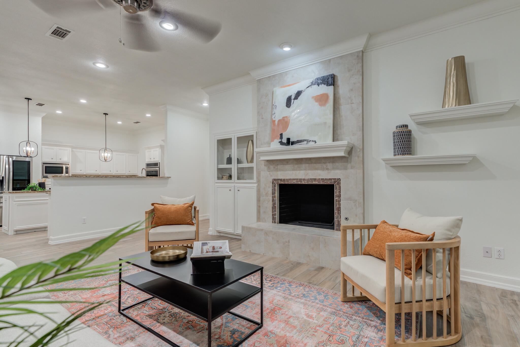 4707 85th Street Lubbock, TX 79424 - Photo 10 of 63 a living room with furniture and a fireplace