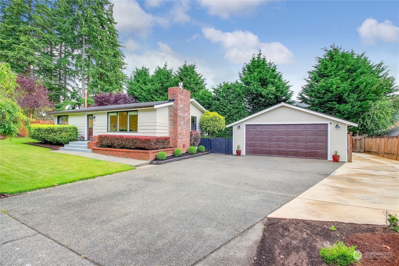 31 213th Street Southwest Bothell, WA 98021 - Photo 1 of 40 a front view of a house with yard