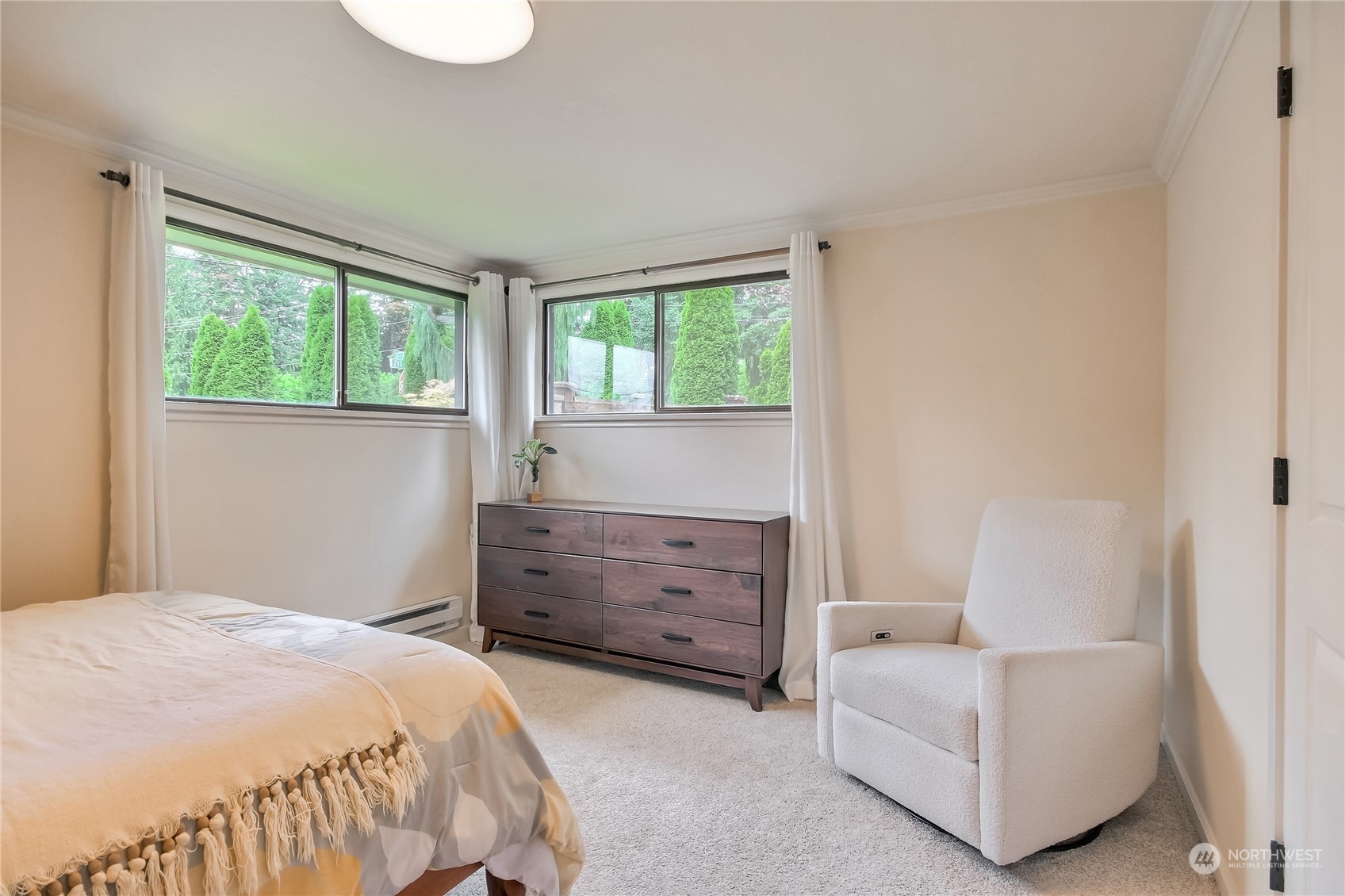 31 213th Street Southwest Bothell, WA 98021 - Photo 17 of 40 a bedroom with a bed and a couch