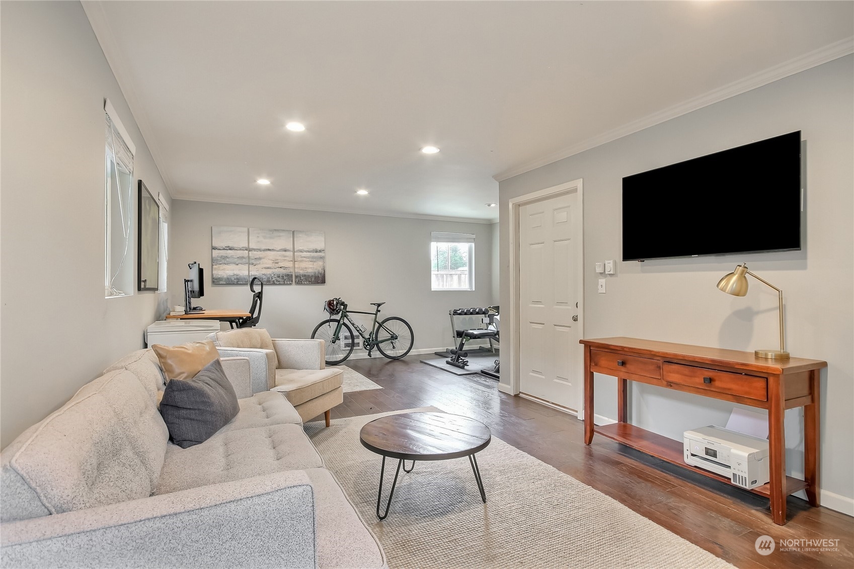 31 213th Street Southwest Bothell, WA 98021 - Photo 20 of 40 a living room with furniture and a flat screen tv