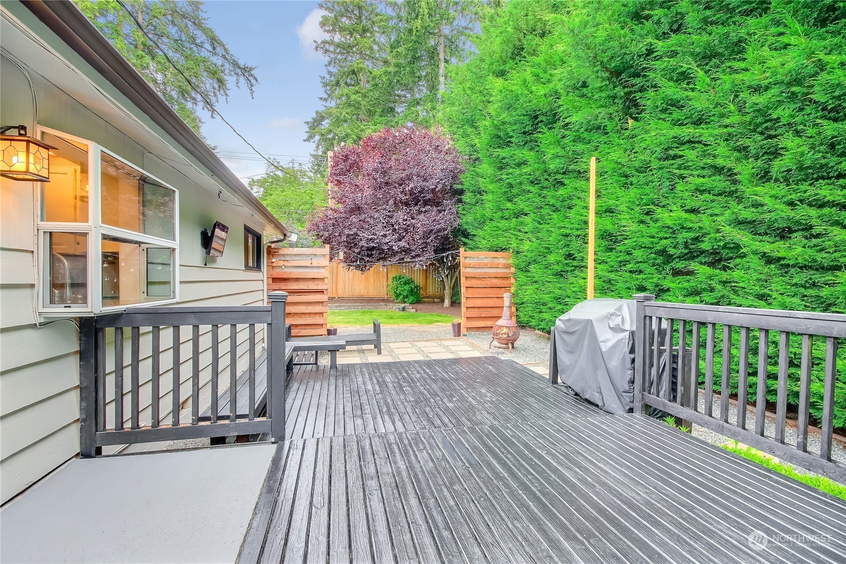 31 213th Street Southwest Bothell, WA 98021 - Photo 23 of 40 a view of balcony with wooden floor and outdoor seating
