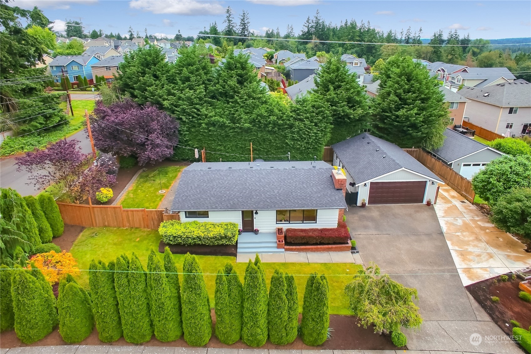 31 213th Street Southwest Bothell, WA 98021 - Photo 32 of 40 an aerial view of a house with swimming pool and garden