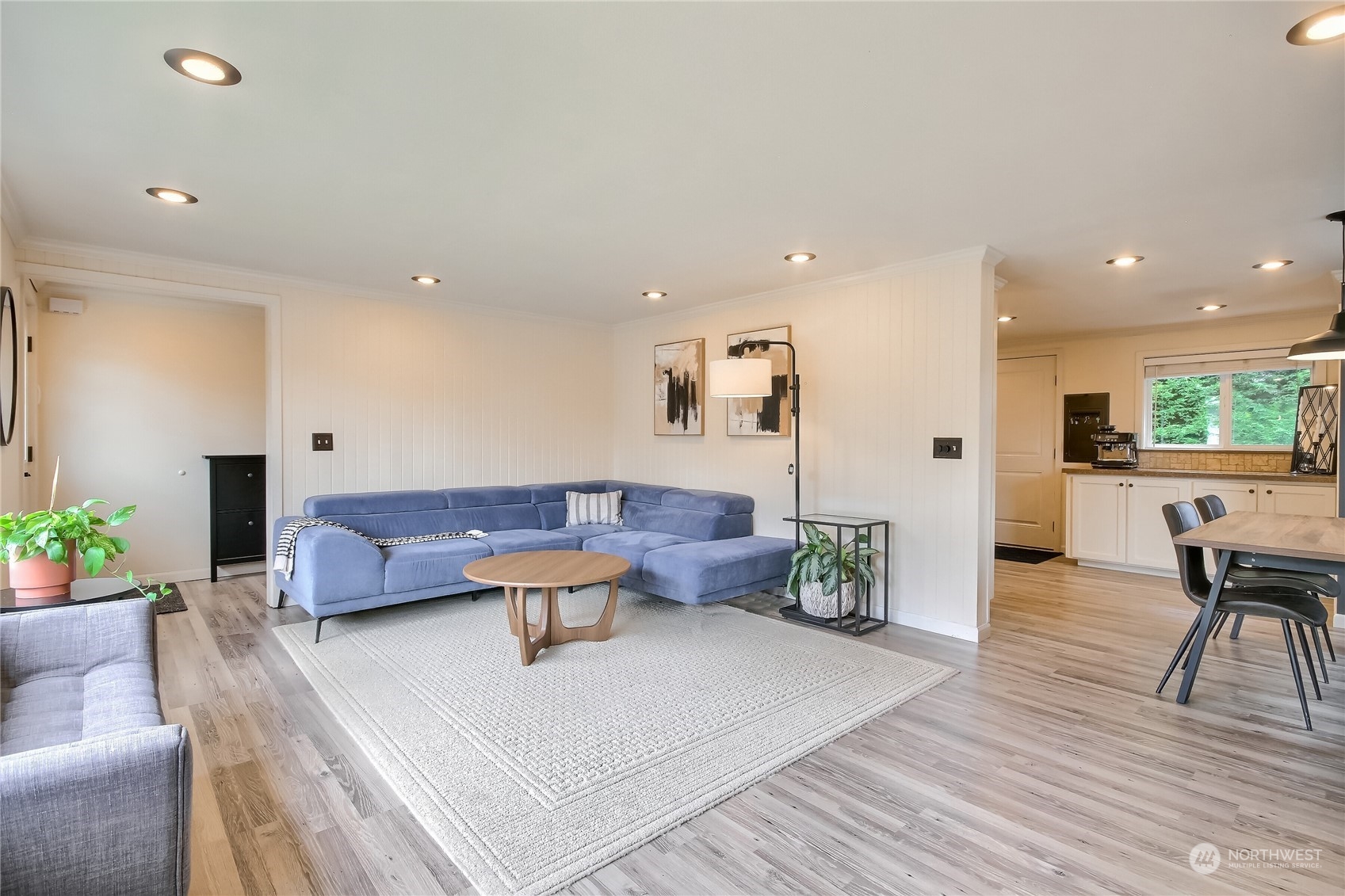 31 213th Street Southwest Bothell, WA 98021 - Photo 6 of 40 a living room with furniture and wooden floor