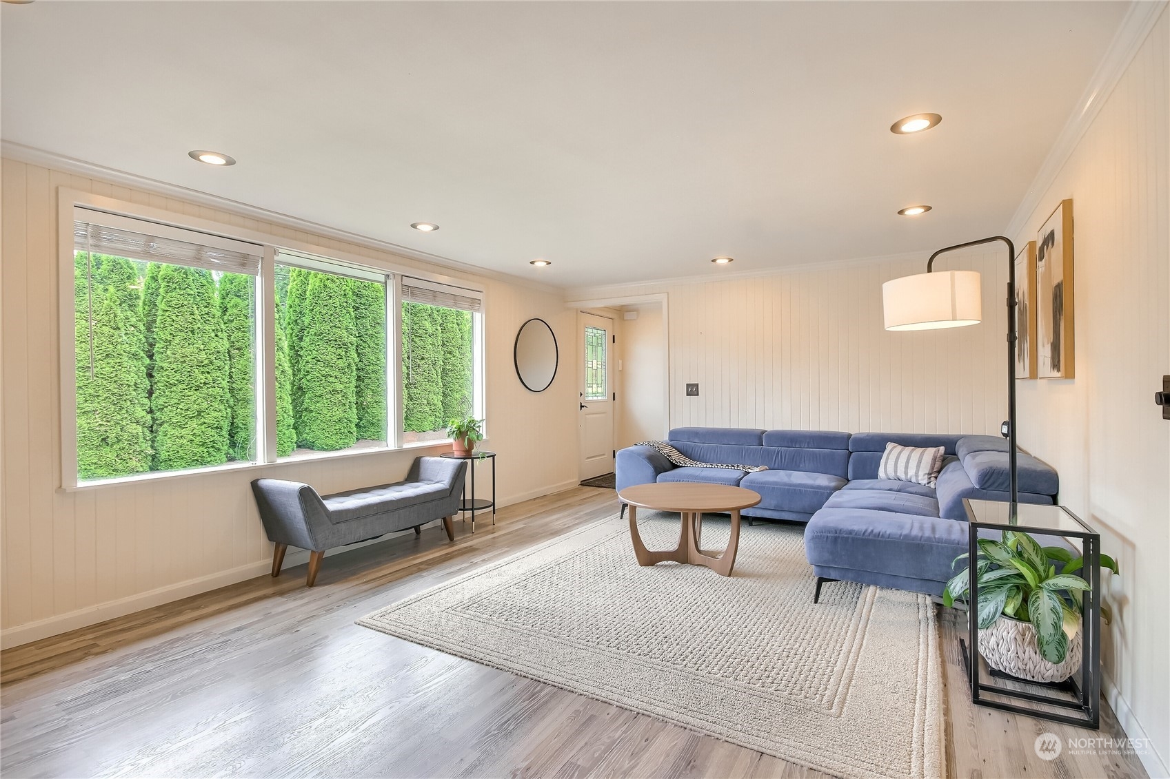 31 213th Street Southwest Bothell, WA 98021 - Photo 7 of 40 a living room with furniture and a large window