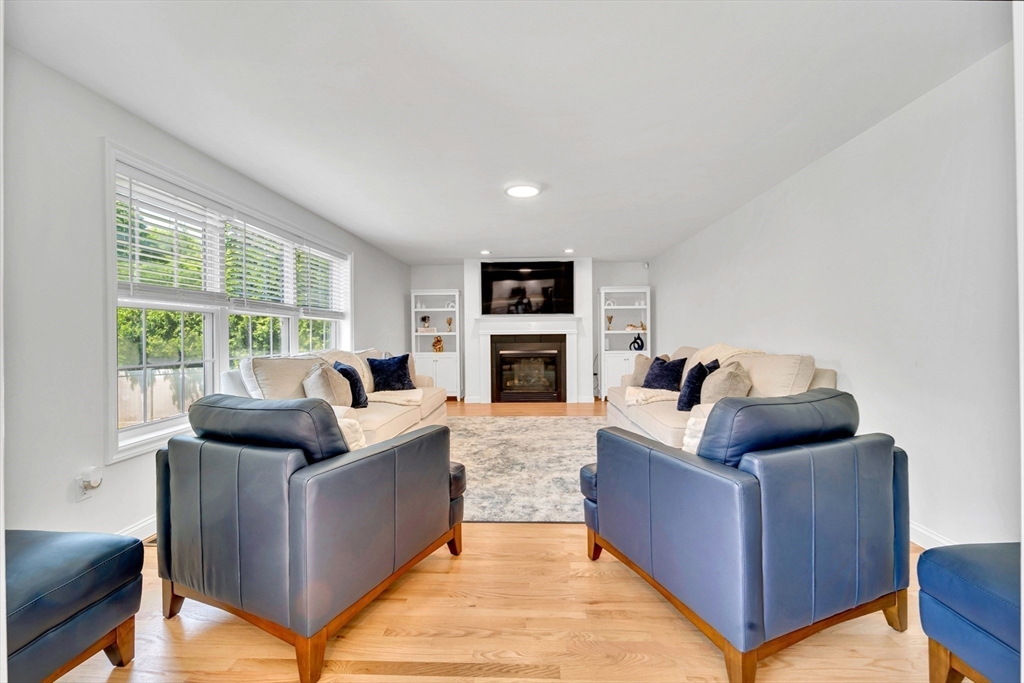 47 Fenwick Circle Methuen, MA 01844 - Photo 18 of 42 a living room with furniture and a fireplace