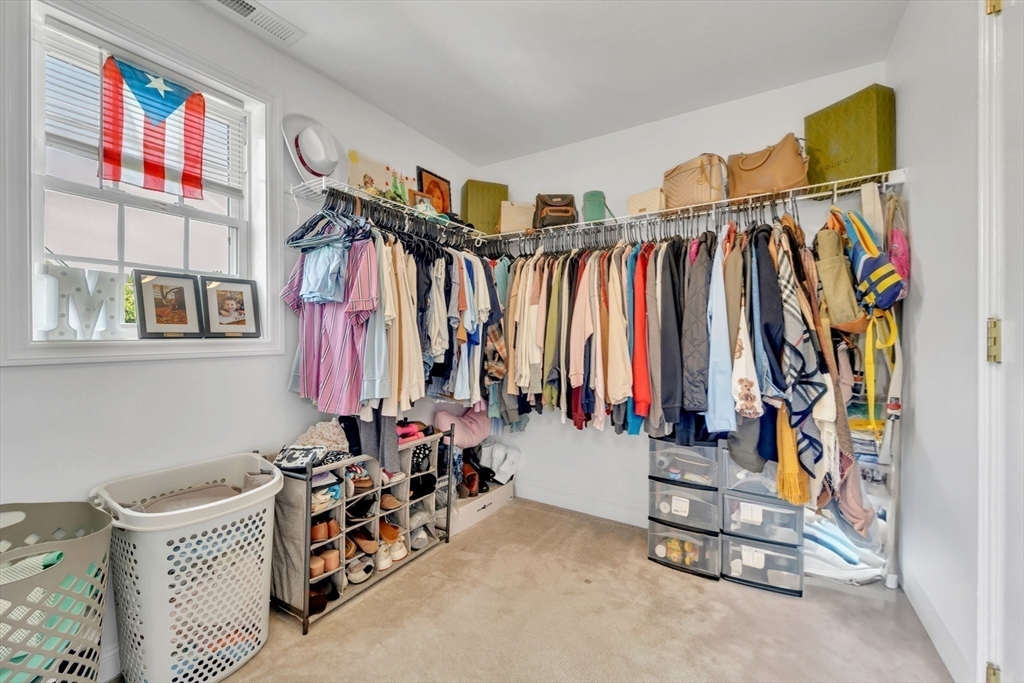 47 Fenwick Circle Methuen, MA 01844 - Photo 25 of 42 a view of walk in closet with clothes