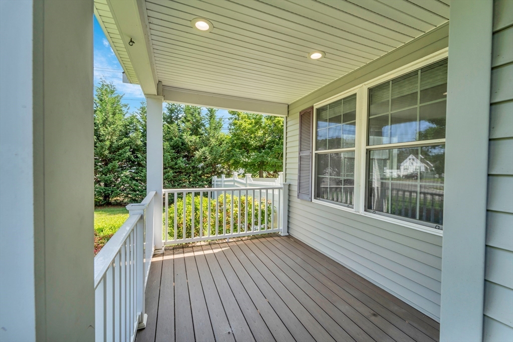 47 Fenwick Circle Methuen, MA 01844 - Photo 6 of 42 a view of a balcony with wooden floor