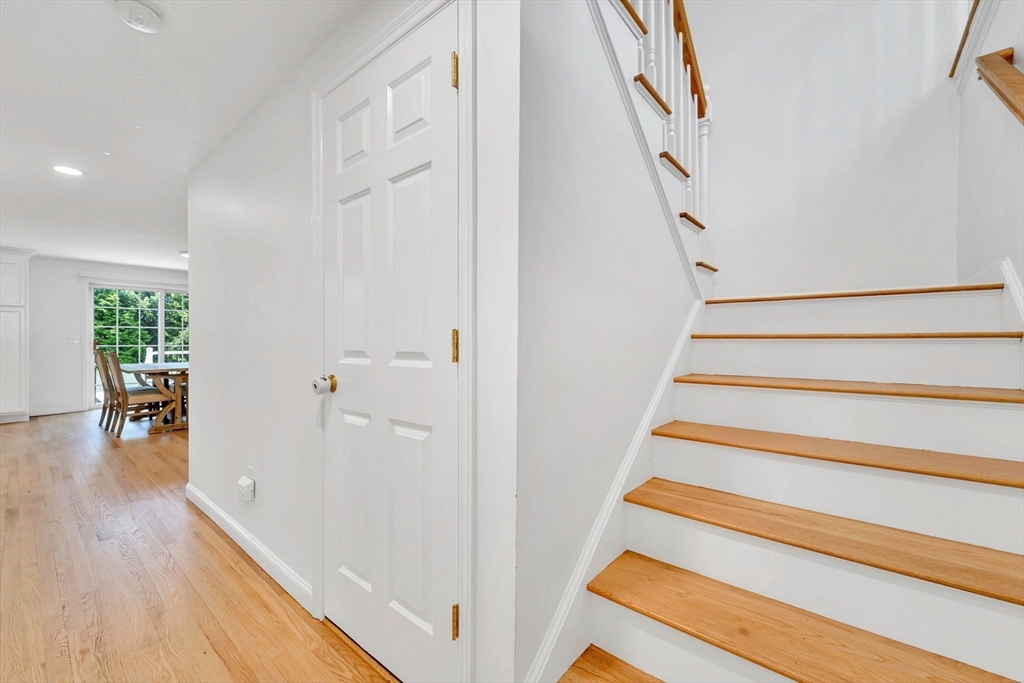 47 Fenwick Circle Methuen, MA 01844 - Photo 8 of 42 a view of entryway and hall with wooden floor