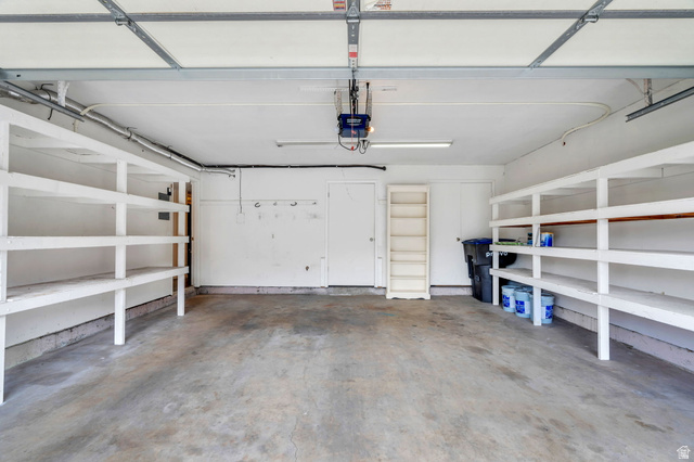 3221 North Shadowbrook Circle Provo, UT 84604 - Photo 29 of 29 Garage with a garage door opener