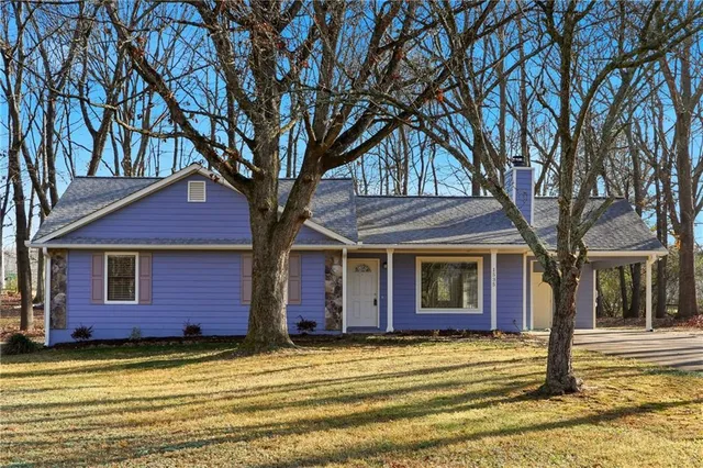 a view of a house with a swimming pool
