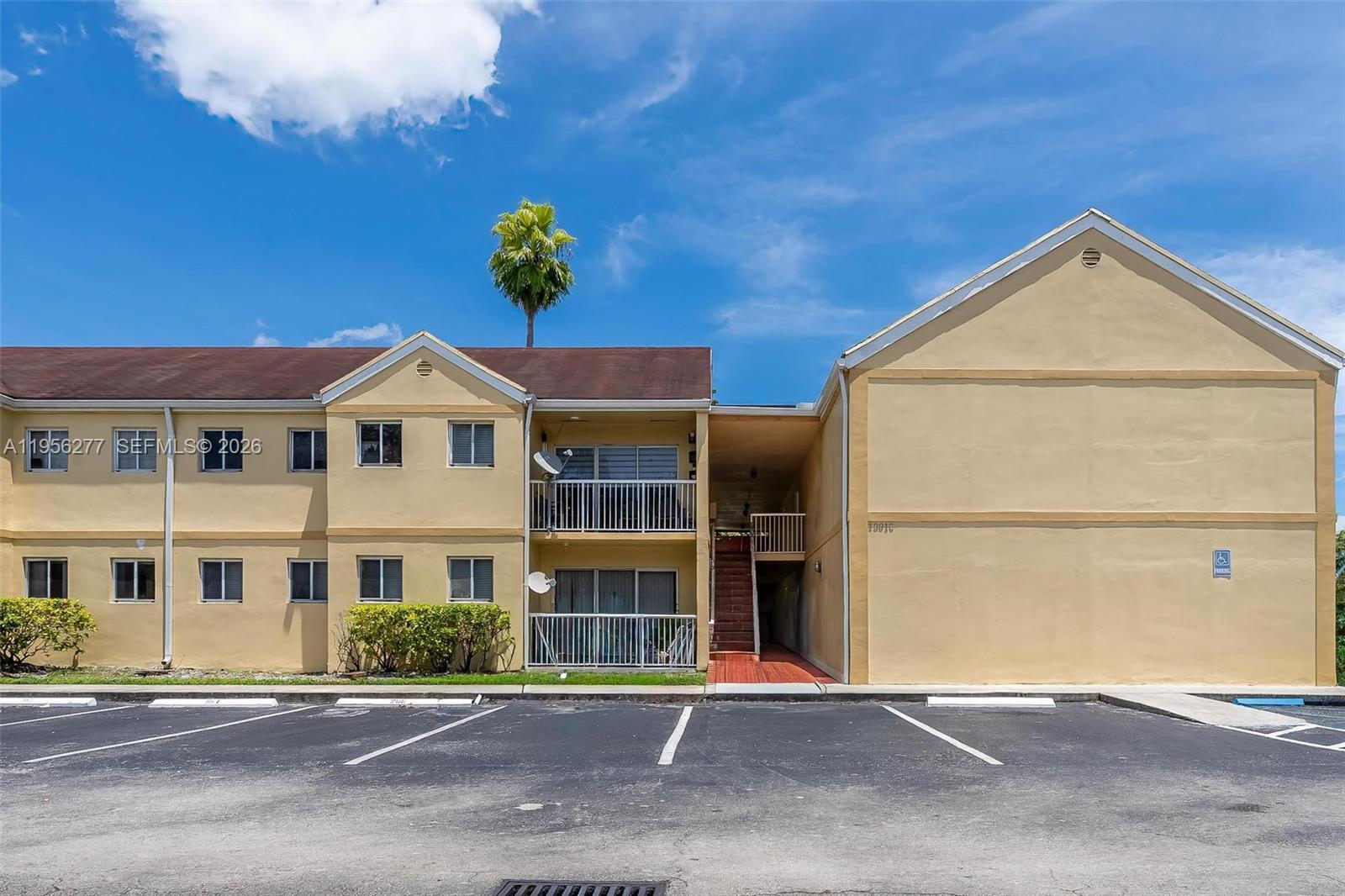 13810 Southwest 112th Street, Unit 102 Miami, FL 33186 - Photo 22 of 28 a view of multiple houses with a street