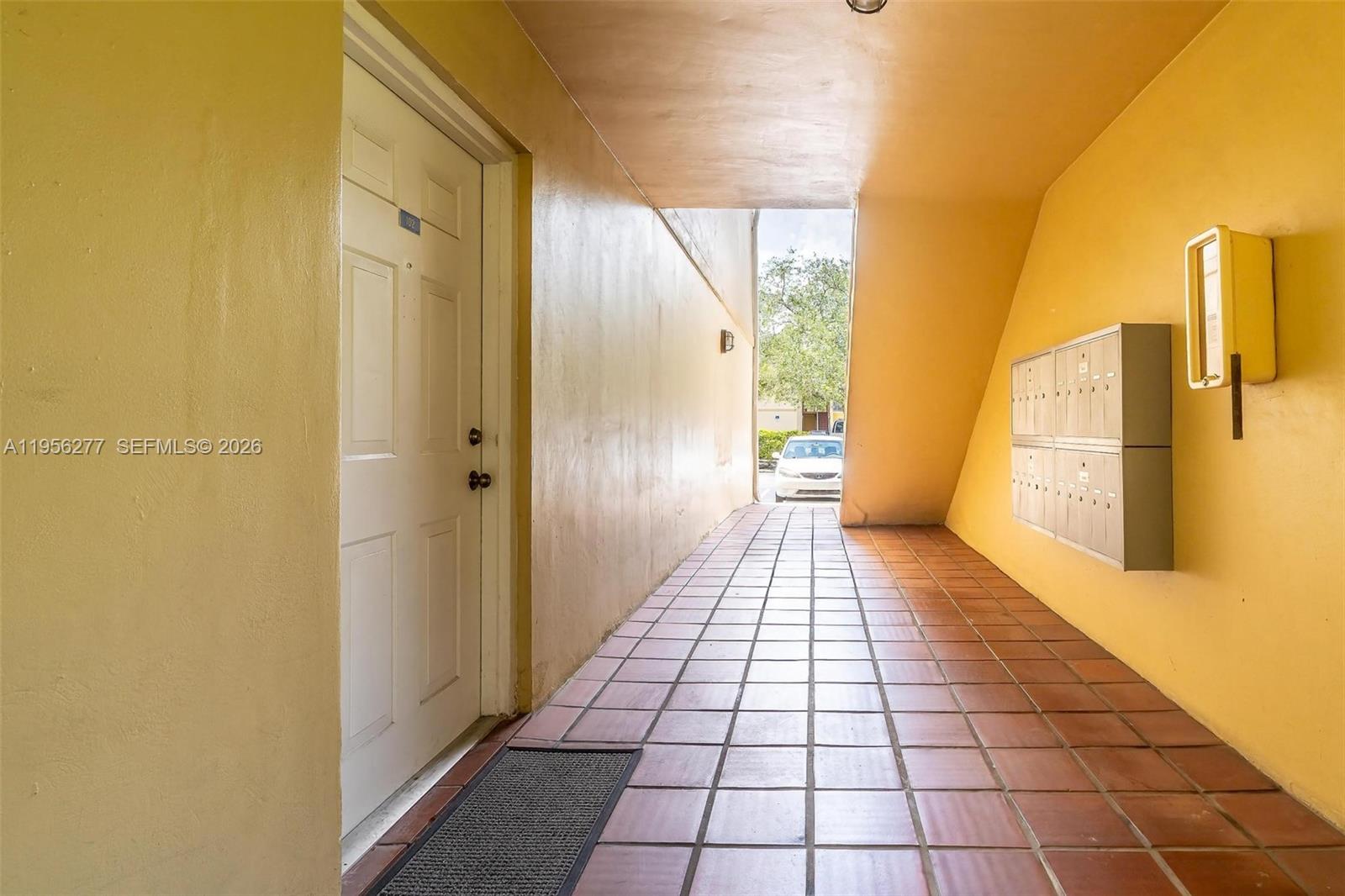 13810 Southwest 112th Street, Unit 102 Miami, FL 33186 - Photo 24 of 28 a view of a bathroom with a shower