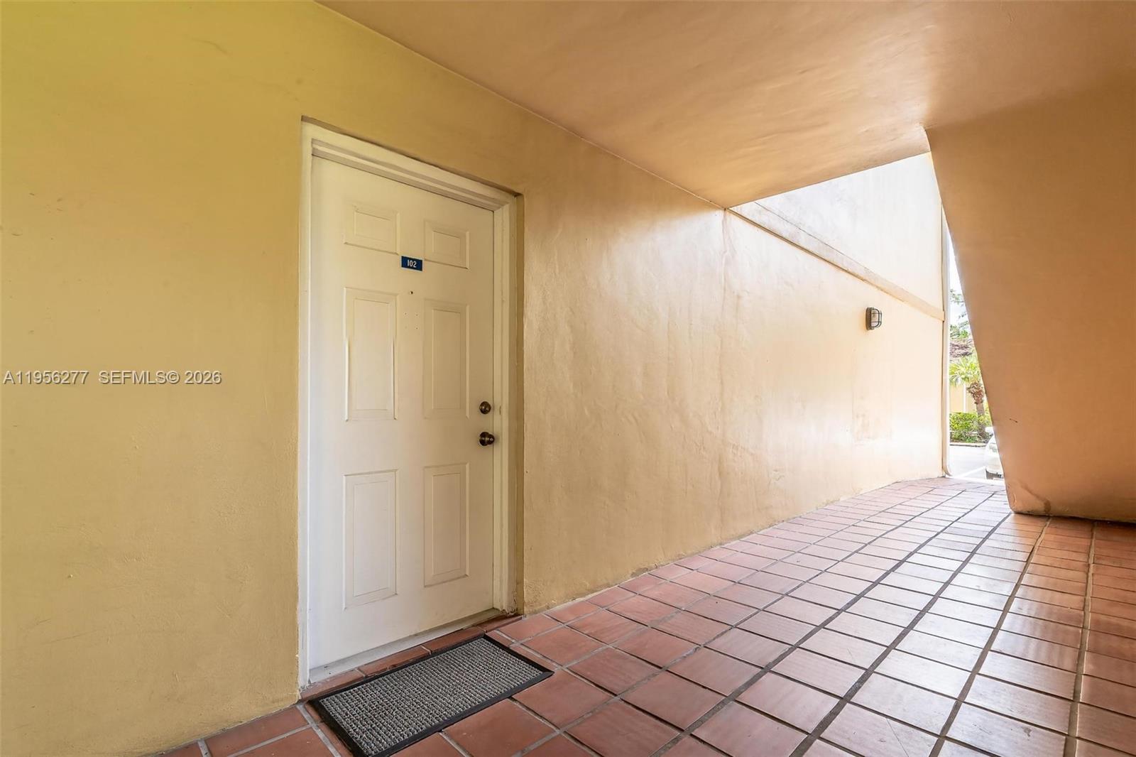 13810 Southwest 112th Street, Unit 102 Miami, FL 33186 - Photo 25 of 28 a view of an empty room