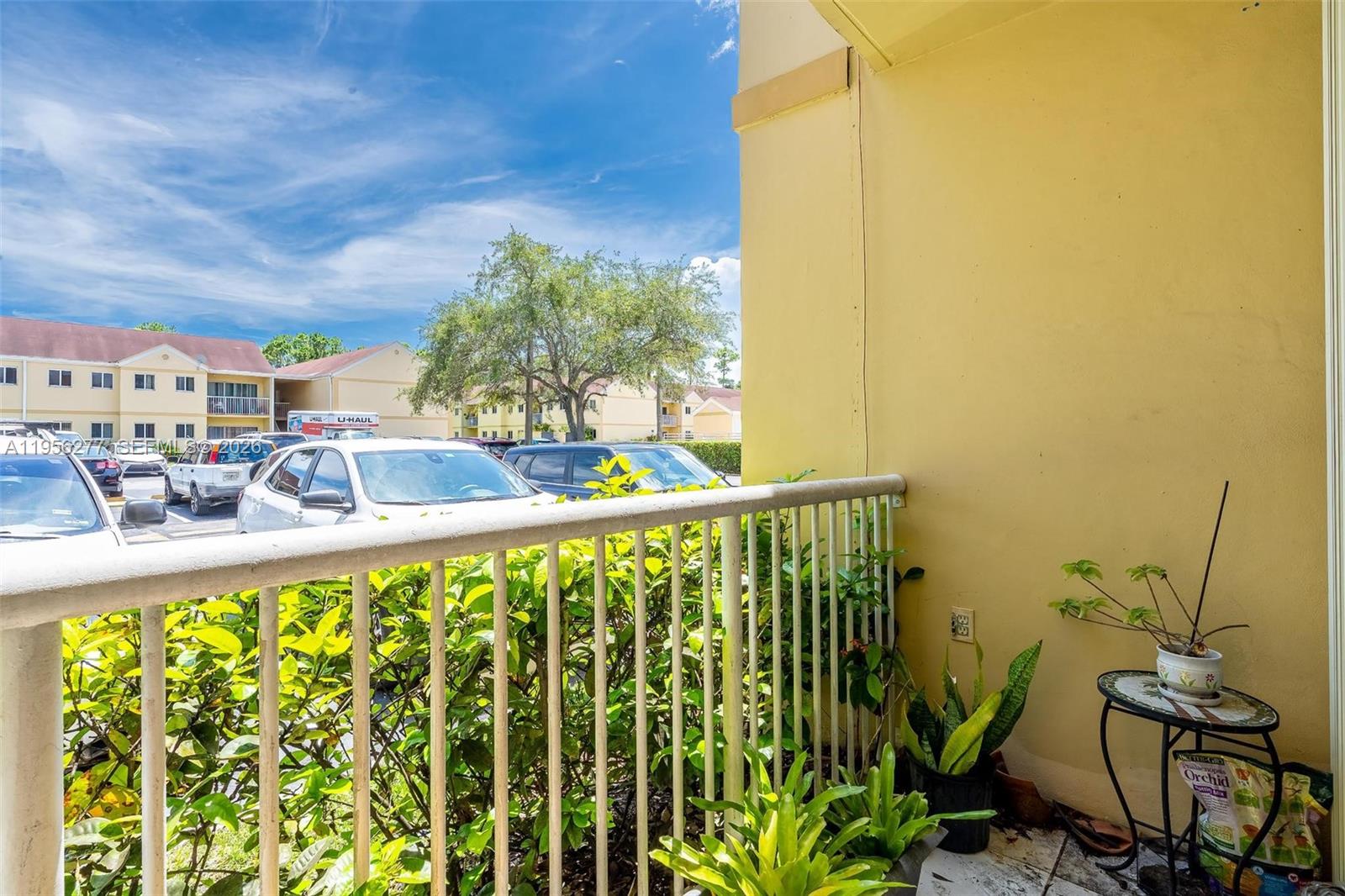 13810 Southwest 112th Street, Unit 102 Miami, FL 33186 - Photo 28 of 28 a view of a balcony with chairs