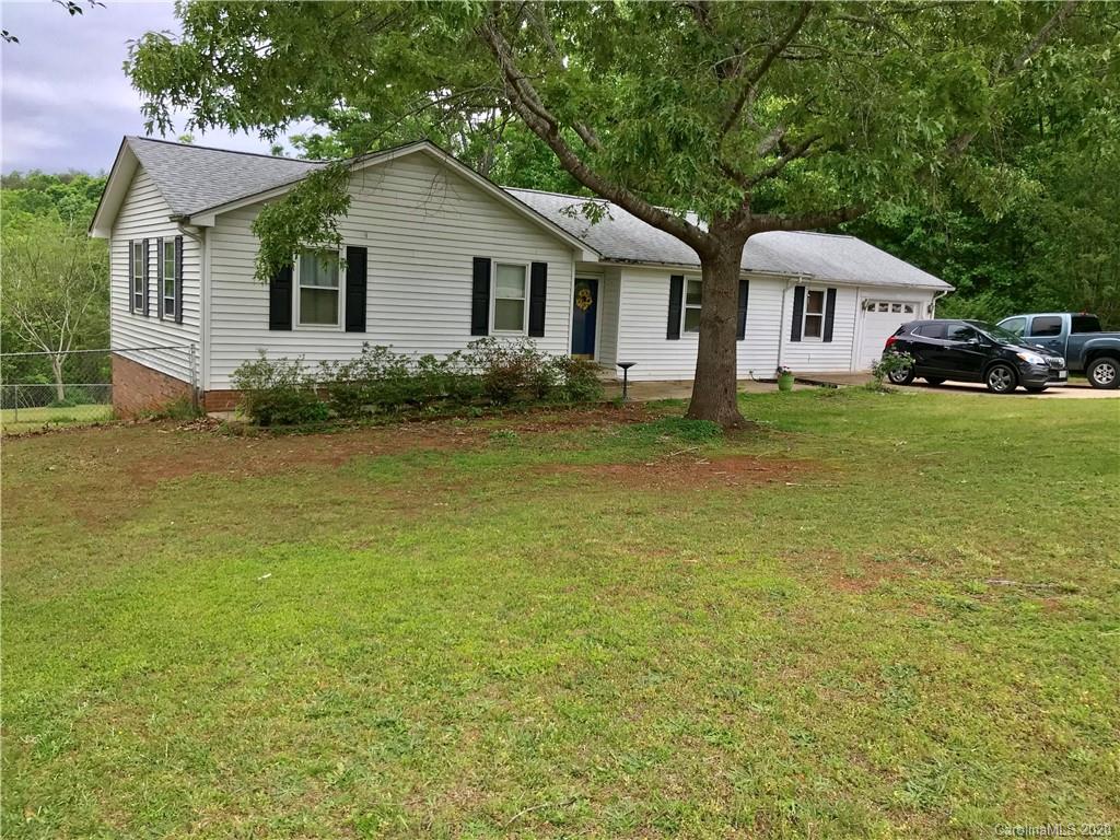 917 Edwards St Extension Rutherfordton, NC 28139 - Photo 1 of 23 a front view of a house with garden