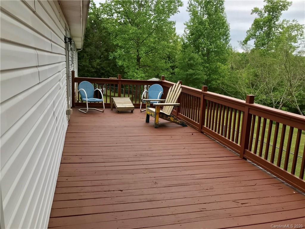 917 Edwards St Extension Rutherfordton, NC 28139 - Photo 5 of 23 a view of backyard with a deck and wooden floor