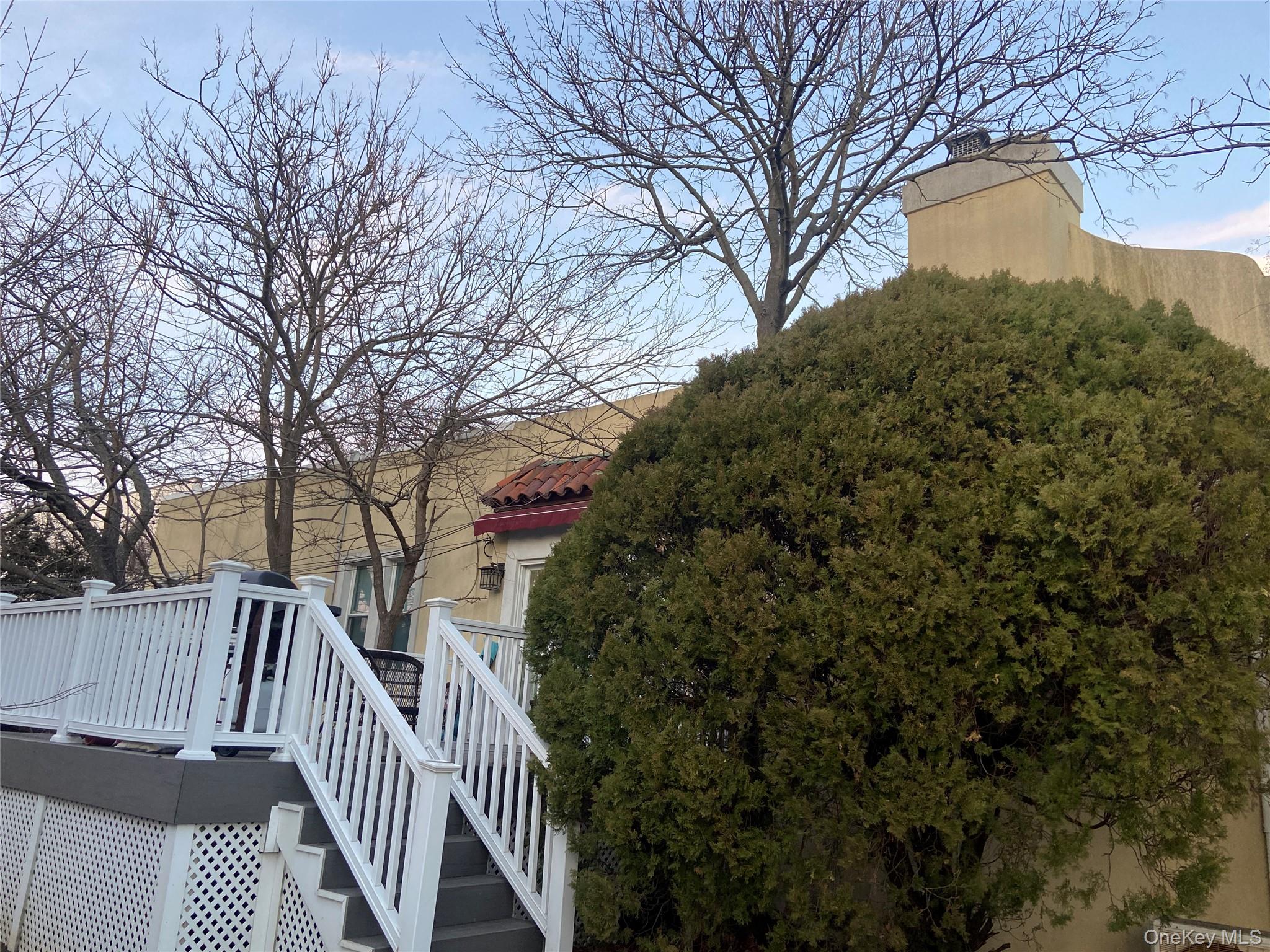 237 West Walnut Street Long Beach, NY 11561 - Photo 2 of 6 a view of a house with a yard