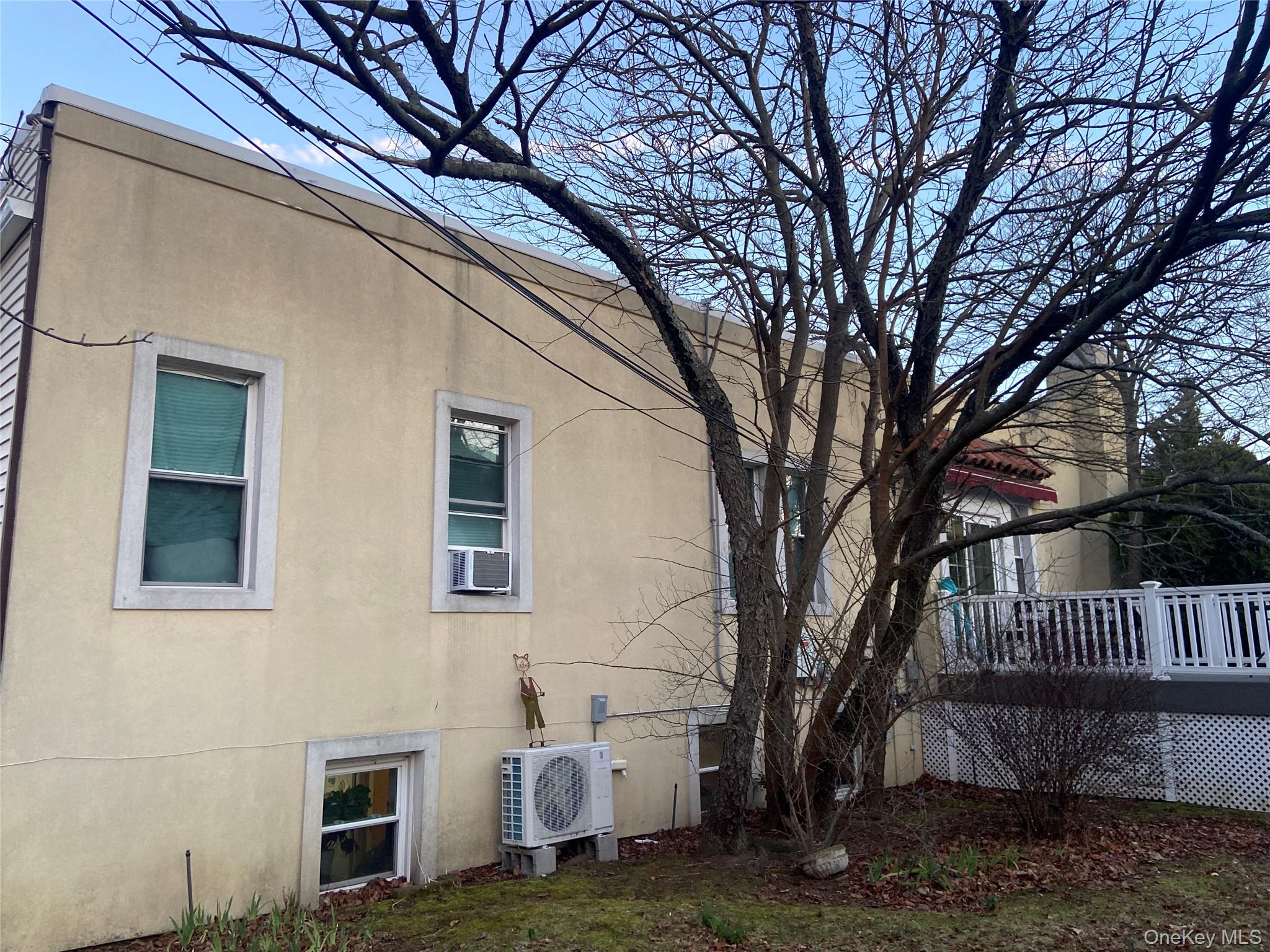 237 West Walnut Street Long Beach, NY 11561 - Photo 3 of 6 a view of a house with a yard
