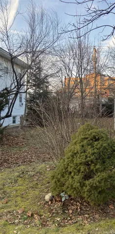 a view of outdoor space and a yard