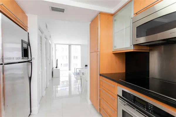 a view of storage and utility room with washer and dryer