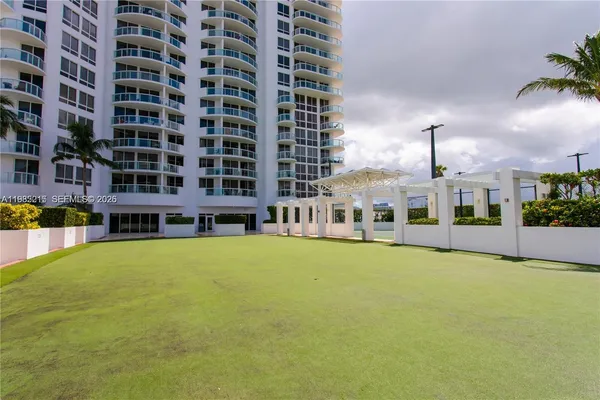a view of a golf course with a lake