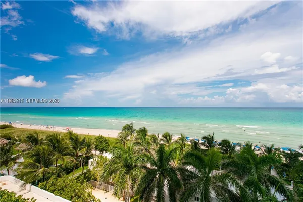 a room with gym equipment and large window