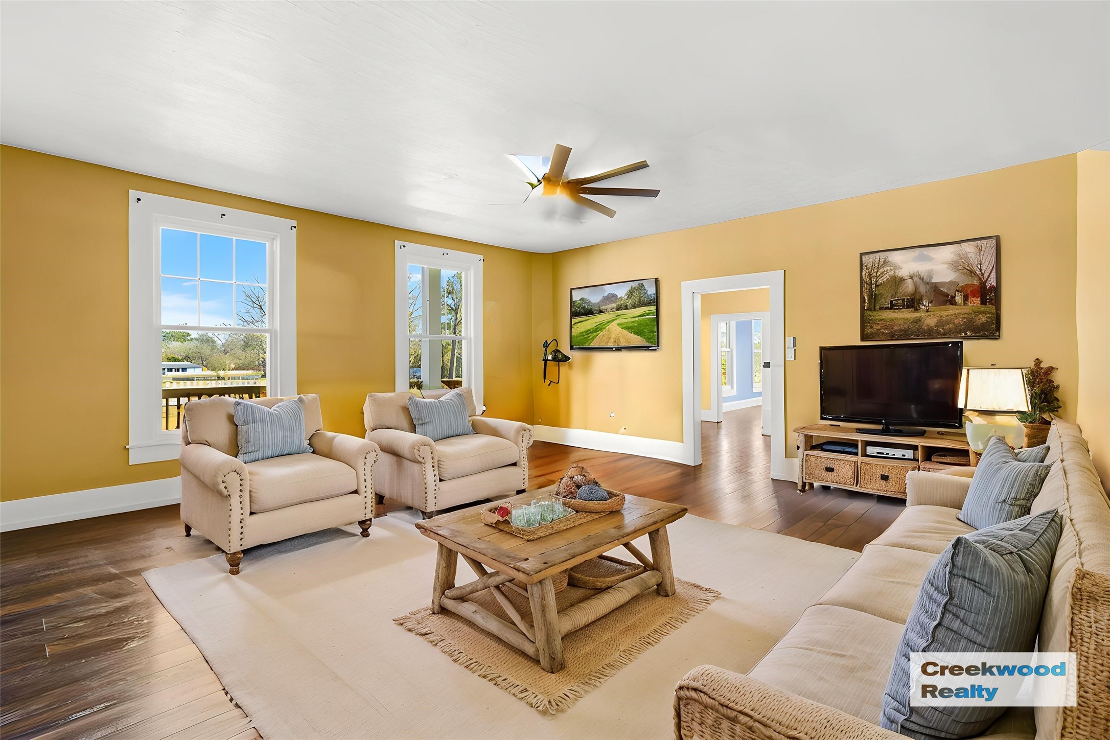 500 Highway 156 Point Blank, TX 77364 - Photo 11 of 50 a living room with furniture a flat screen tv and a large window