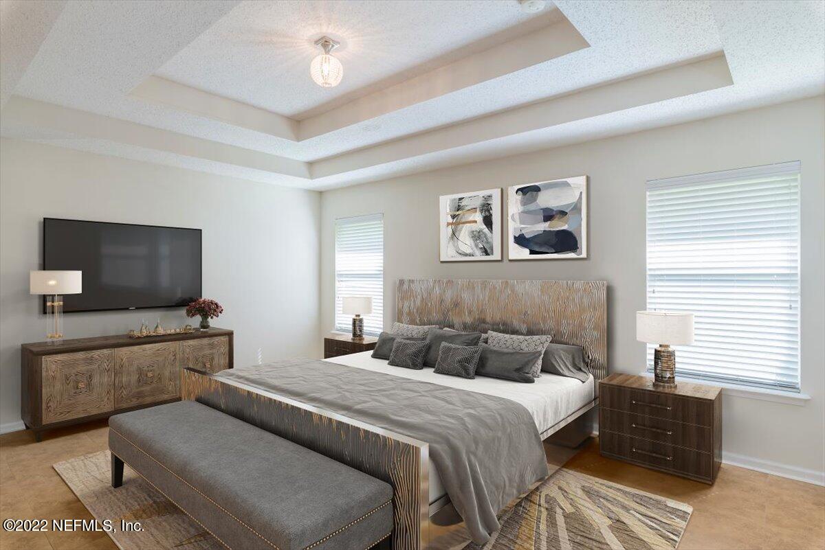11726 Raindrop Road Jacksonville, FL 32219 - Photo 21 of 36 20-3_masterbedroom staged