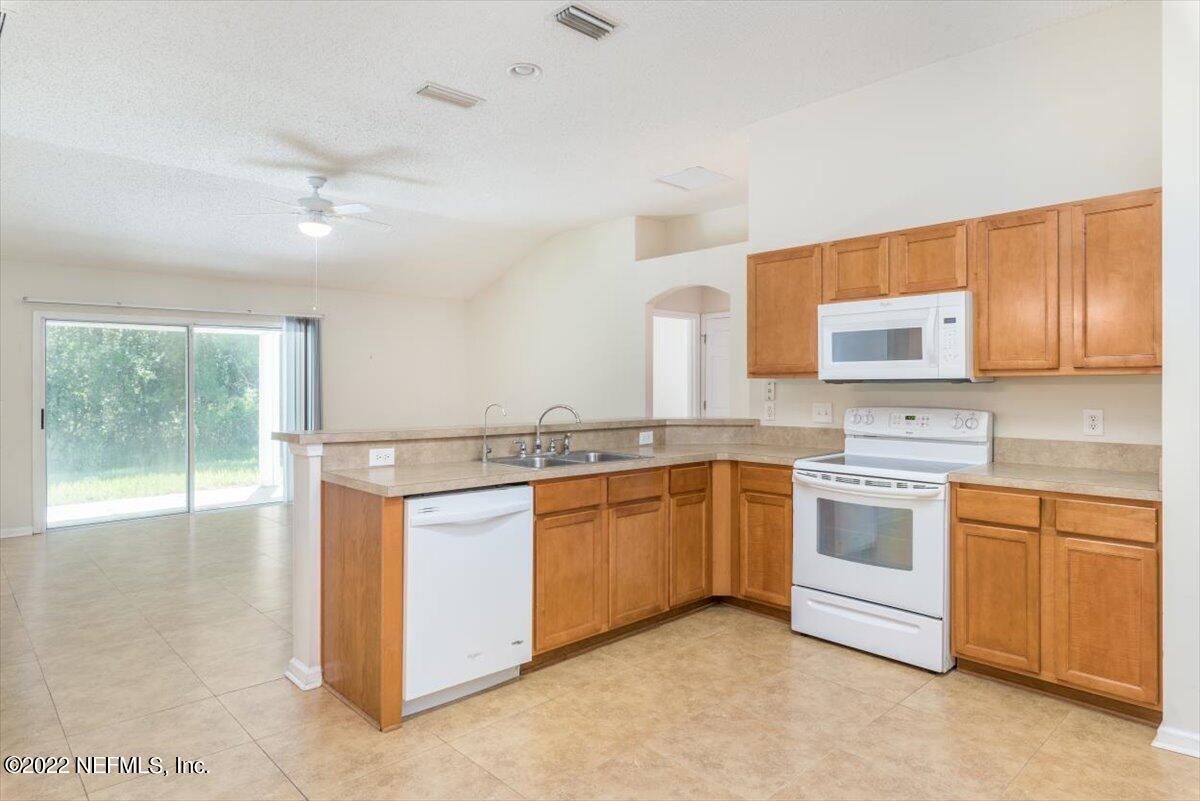 11726 Raindrop Road Jacksonville, FL 32219 - Photo 9 of 36 kitchen